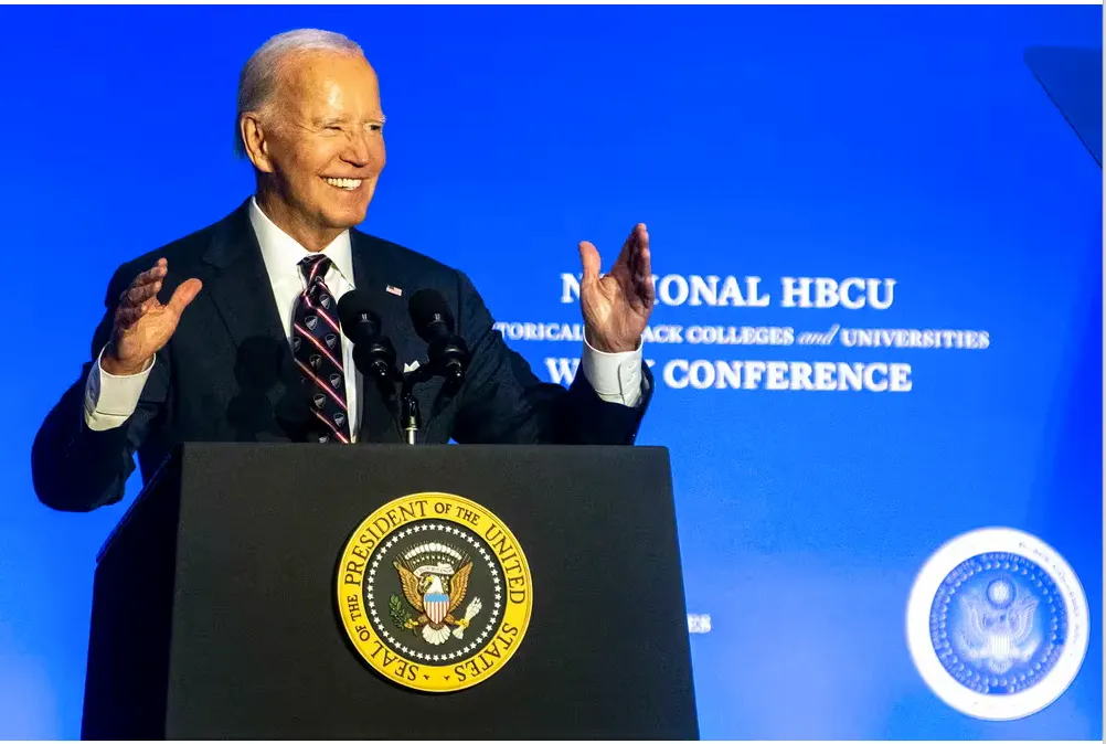 The President speaking at a lectern in front of a National HBCU Week Conference backdrop